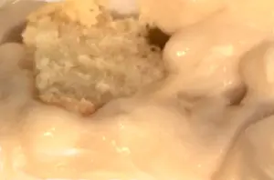 Get this old fashioned Tarte a la Bouille cake recipe and enjoy a traditional Cajun dessert. Homemade butter cake smothered with a sweet egg custard. So good!