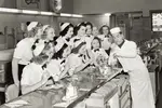 Read a brief ice cream sundae history describing the invention of this delicious frozen dessert and how ice cream parlors overcame the scandal surrounding it.