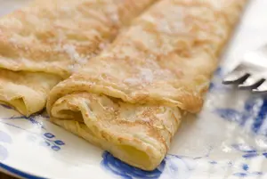Get Grandma's traditional English pancake recipe and make those delicious rolled pancakes the British are known for. Simple ingredients and simple to make!