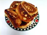 Get this easy chocolate fried pies recipe and enjoy a fried pastry that's really special. If you love butter tarts and chocolate, you will LOVE these pies.