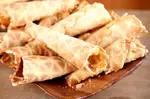 Read the History of Ice Cream Cones and discover how the notorious Penny Lick helped to bring about the invention of today's crispy Waffle Cones.