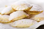 Get Grandma McIlmoyle's old fashioned raisin filled sugar cookie recipe. The yummy easy-to-make raisin filling makes these sugar cookies taste extra delicious.