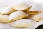Get Grandma McIlmoyle's old fashioned raisin filled sugar cookie recipe. The yummy easy-to-make raisin filling makes these sugar cookies taste extra delicious.