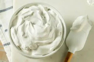 Learn how to make perfect whipped for icing cakes with Grandma's Stabilized Whipped Cream Recipe. It's easy-to-make, reliable, and delicious every time!