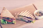 Explore delicious ideas for picnic sandwiches from the 1950s. Features Fannie Farmer's recipes and a White House favorite perfect for modern picnics.