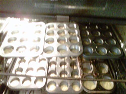 Arrange Muffin Pans in Oven