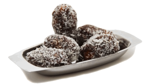 Plateful of Homemade Chocolate Easter Eggs Covered in Coconut