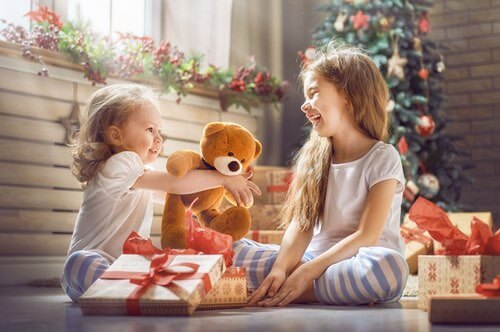 Little Girls Enjoying Christmas Morning