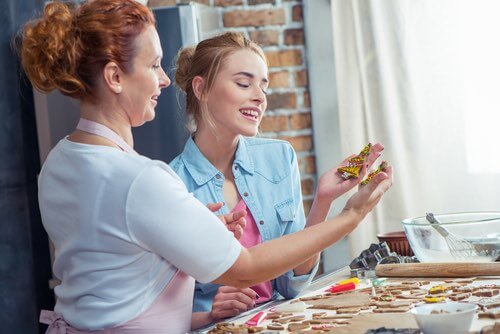 Mother and Daughter Admiring Their Gingerbread Cookies