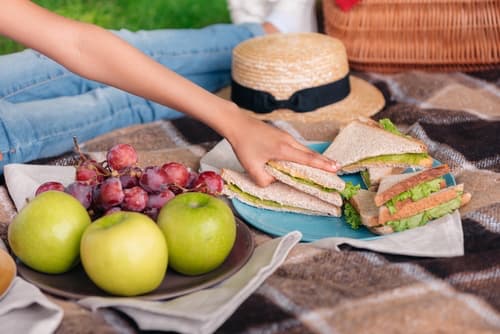 Reaching for a Picnic Sandwich
