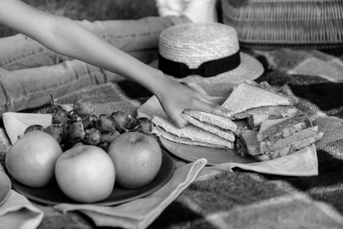 Reaching for a Picnic Sandwich