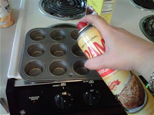 Spray Muffin Pans with Oil