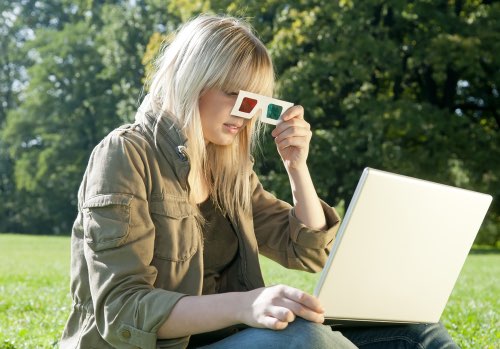 Girl Viewing Anaglyph 3D Images on a Laptop Computer