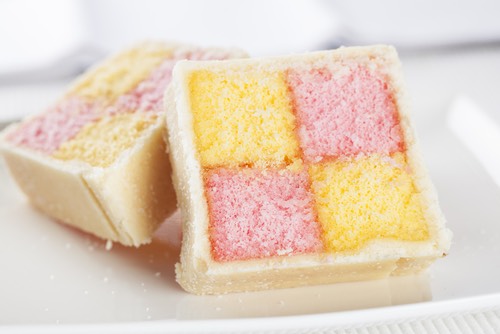 Slices of Homemade Battenberg Cake on a Plate