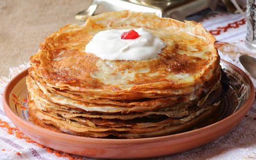 Blini Served with Red Caviar