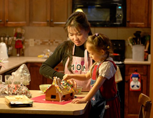 Get this old fashioned gingerbread house recipe and enjoy making and decorating a traditional gingerbread house with your kids at Christmas Holiday time.