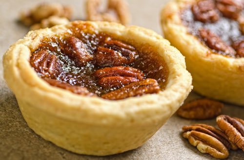 Get Grandma's old fashioned butter tart recipe and make gooey chewy Canadian butter tarts that taste amazing. Make lots because these tarts go fast.