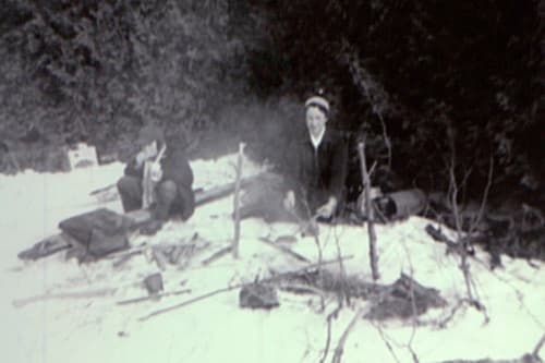 Enjoying Hot Dogs on a Winter Picnic